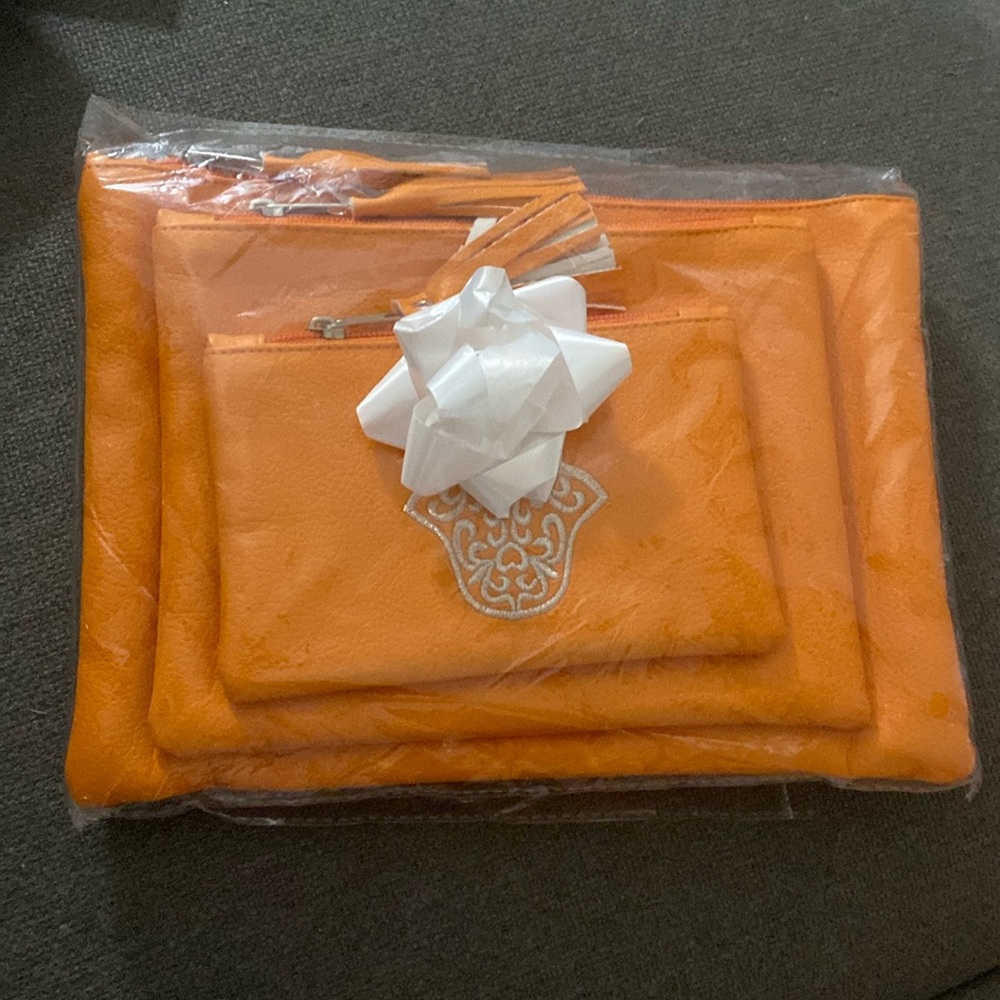 Set of three pouches makeup bags toilotry bags